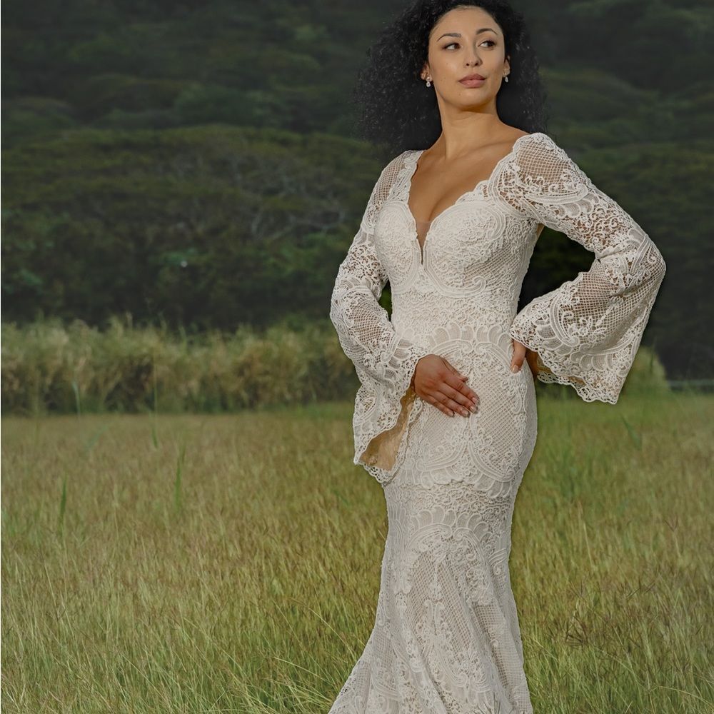 Boho wedding dress with crochet lace bell sleeves and illusion back